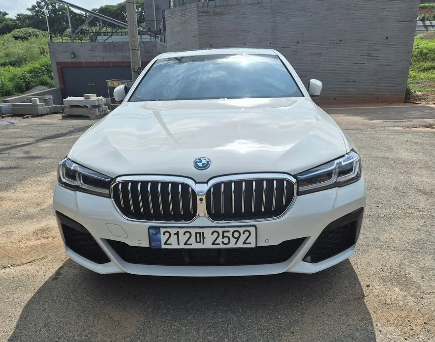 BMW 5-Series — фото 1