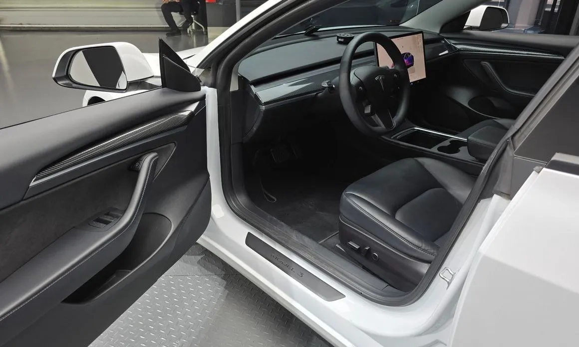 Tesla Model 3 — фото 6