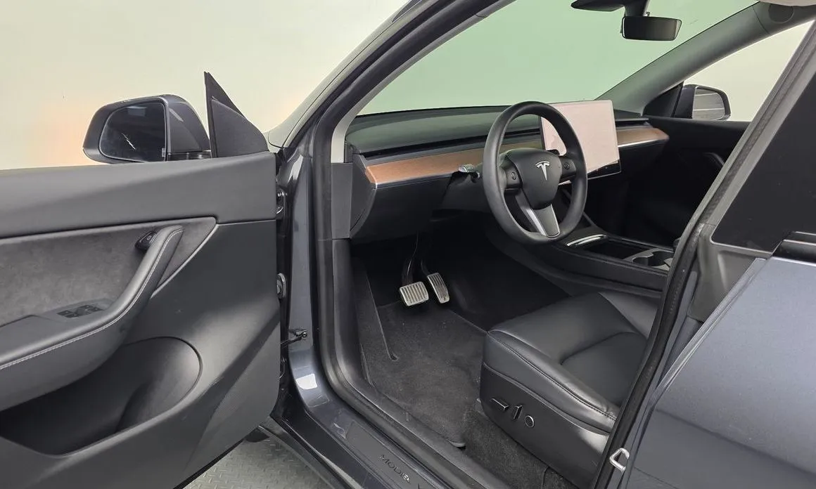 Tesla Model Y — фото 9