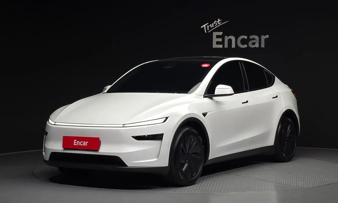 Tesla Model Y — фото 1