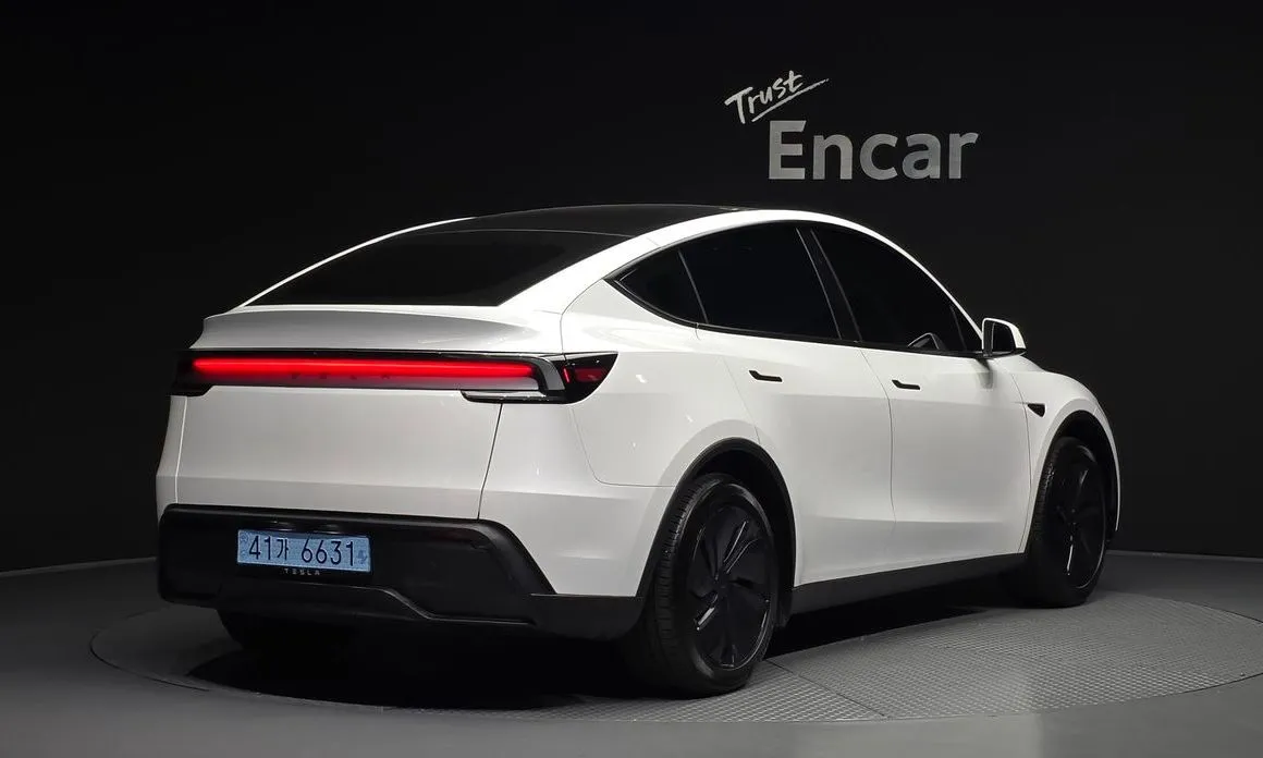 Tesla Model Y — фото 7