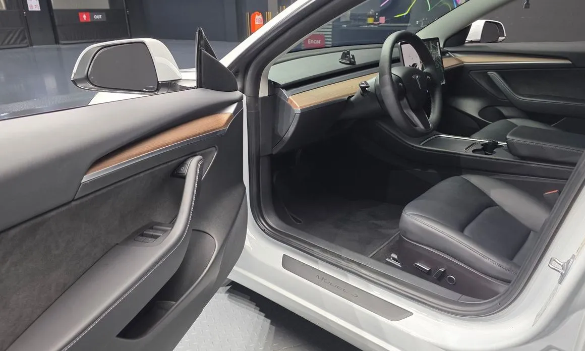 Tesla Model 3 — фото 7