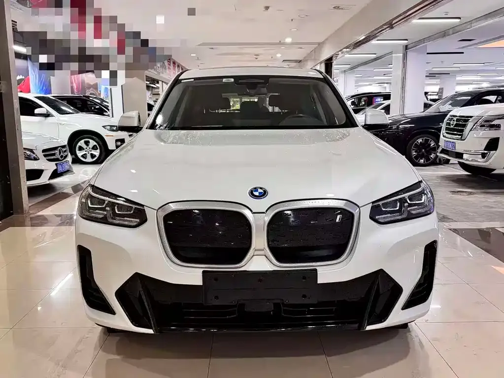 BMW iX3 — фото 9