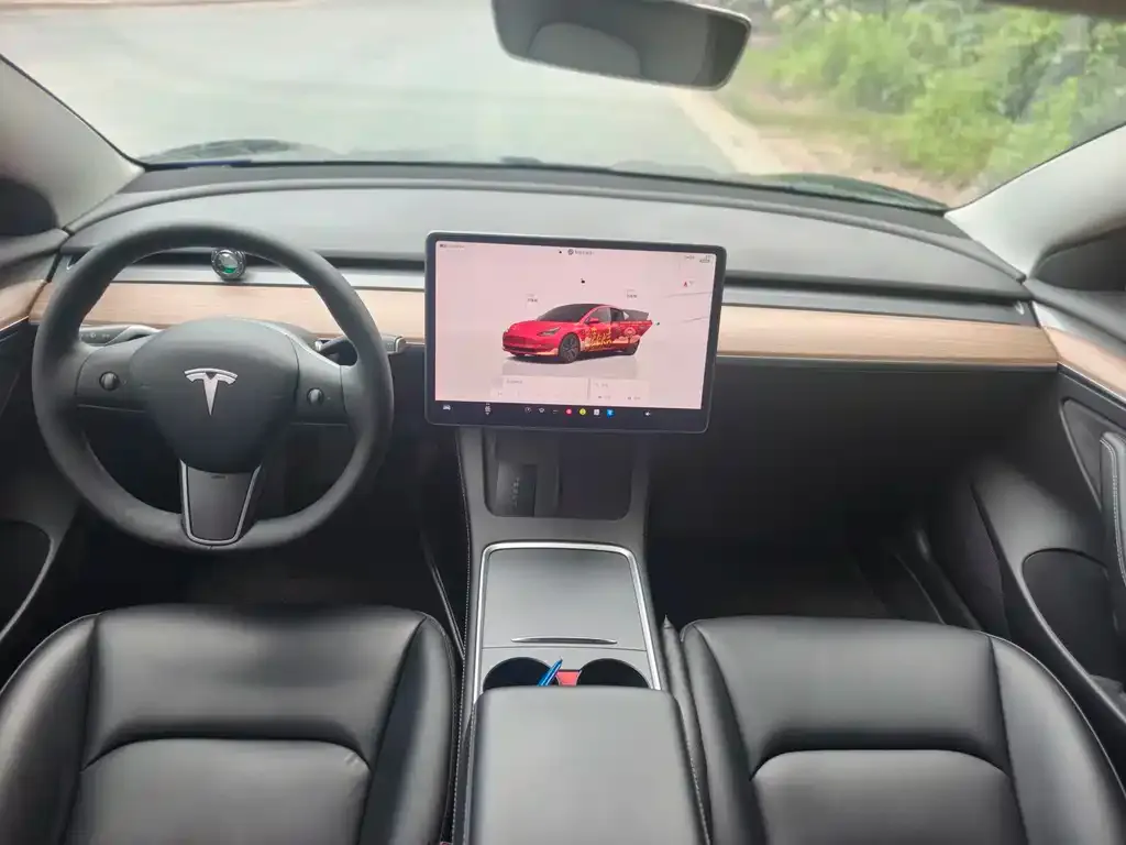 Tesla Model 3 — фото 7