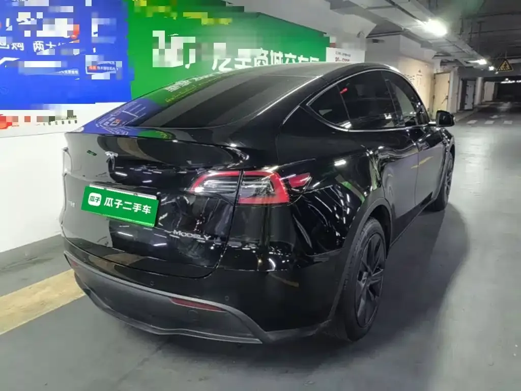 Tesla Model Y — фото 8