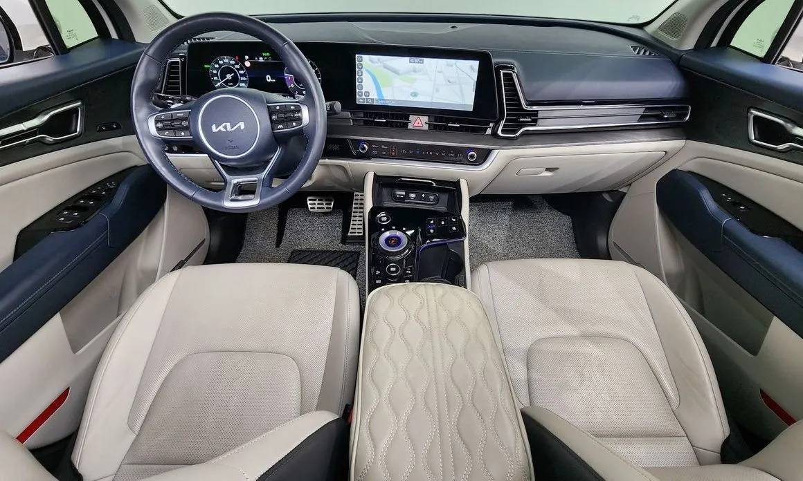 Kia Sportage — фото 10