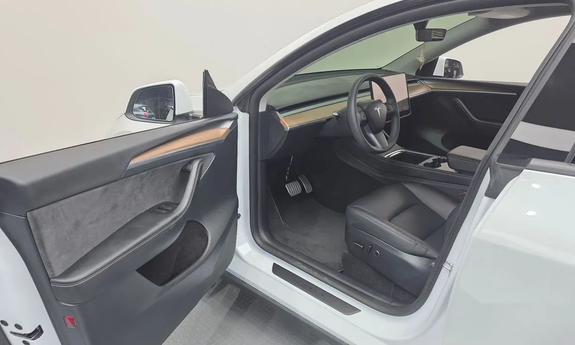Tesla Model Y — фото 6