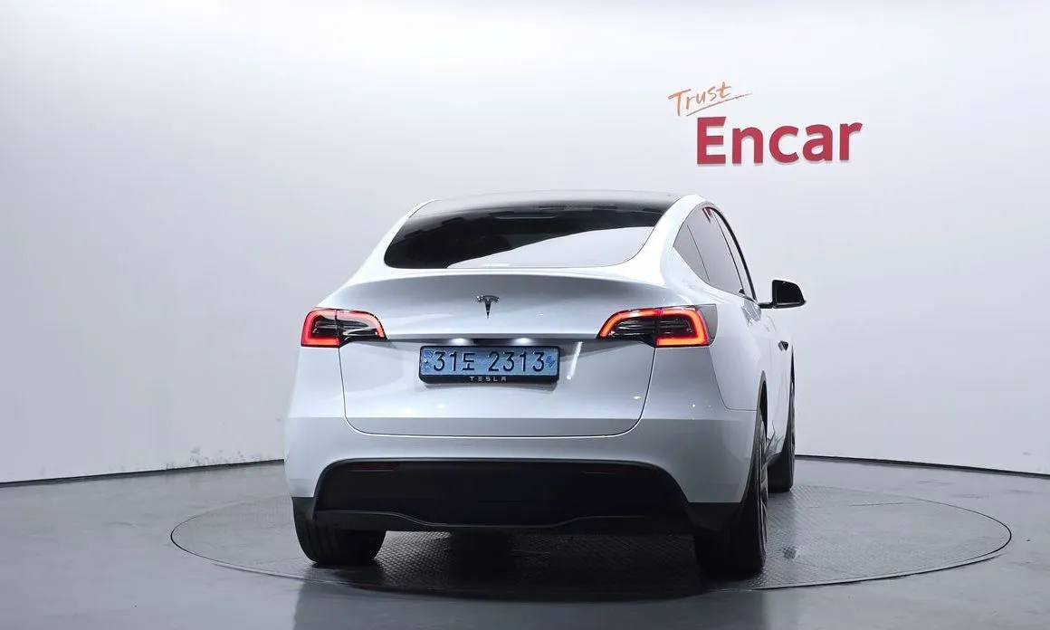 Tesla Model Y — фото 7