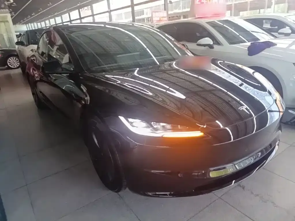 Tesla Model 3 — фото 7