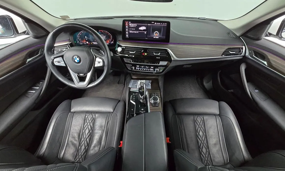 BMW 5-Series — фото 10