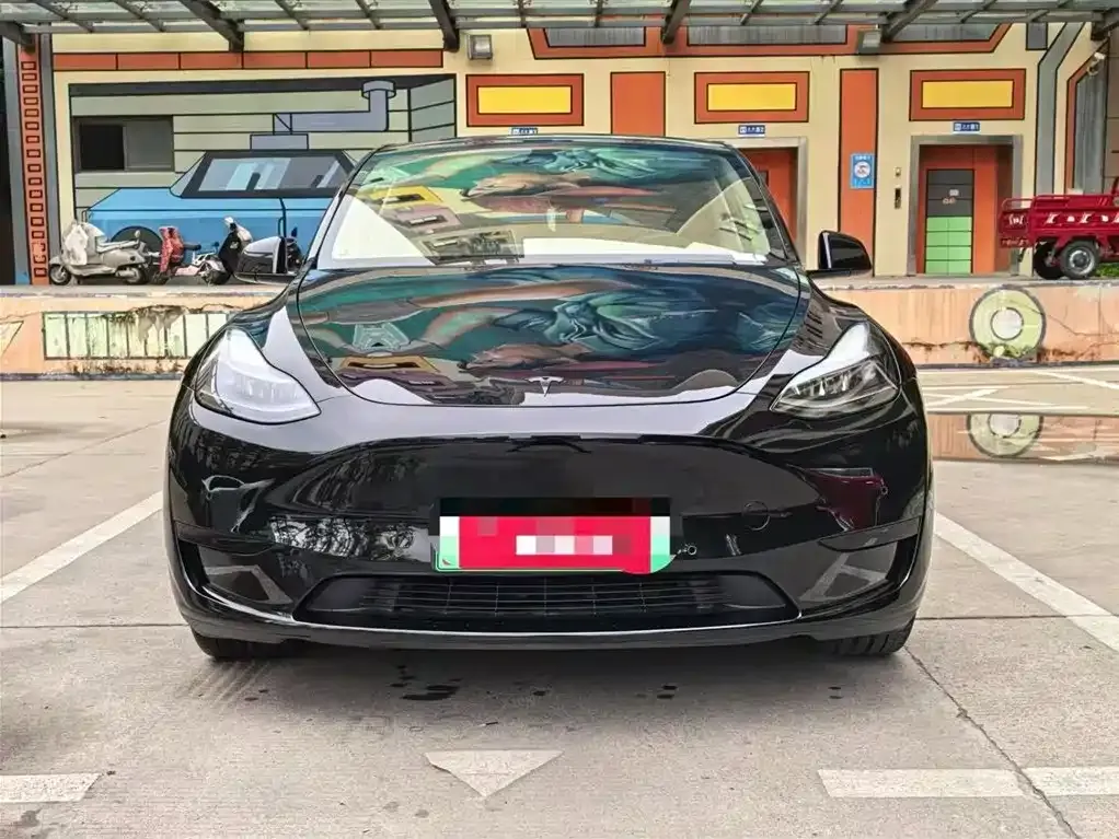 Tesla Model Y — фото 7
