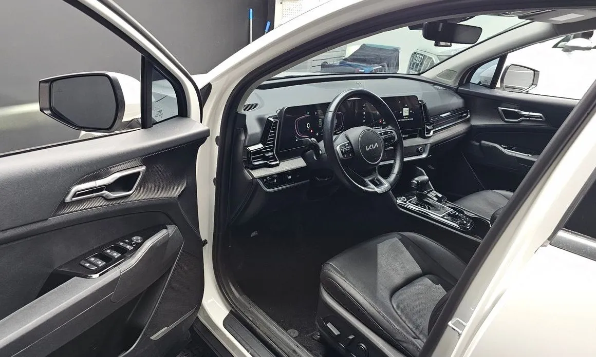 Kia Sportage — фото 10
