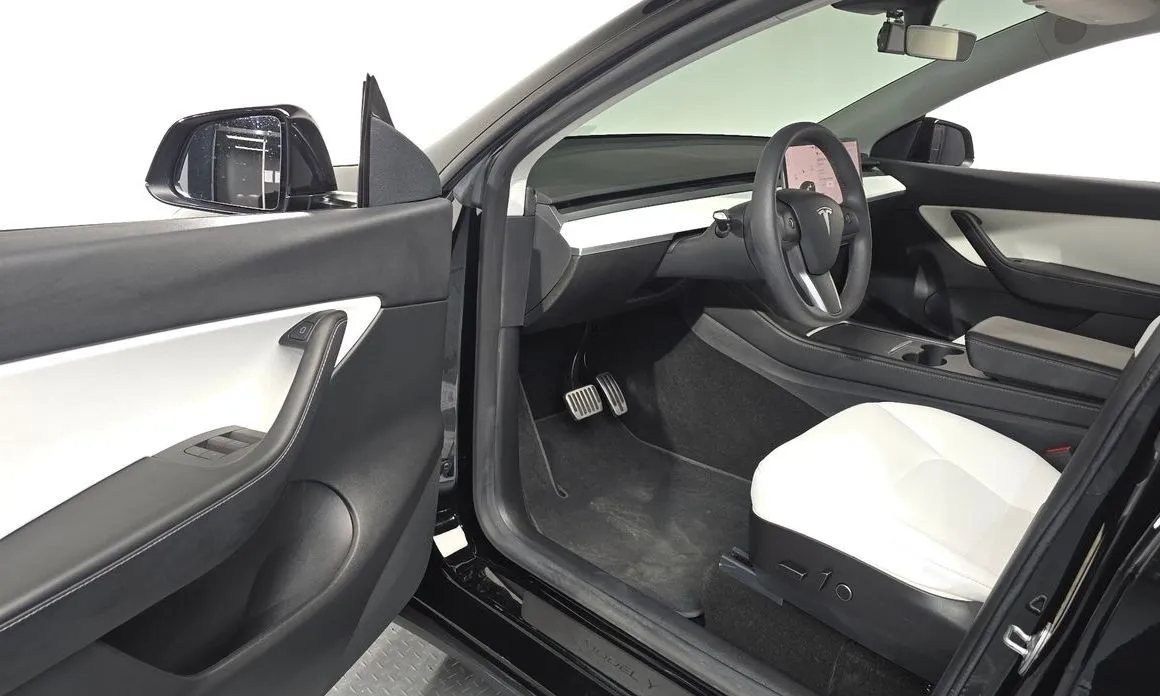 Tesla Model Y — фото 7