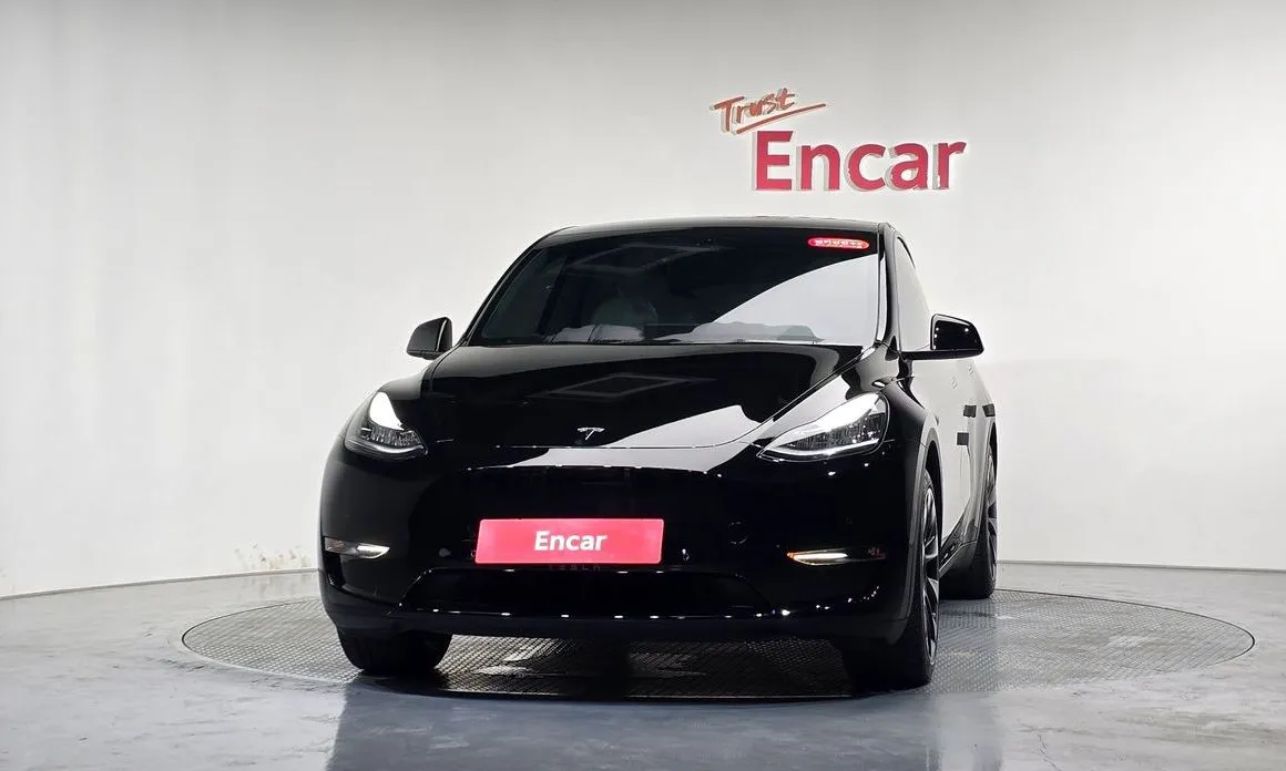 Tesla Model Y — фото 9