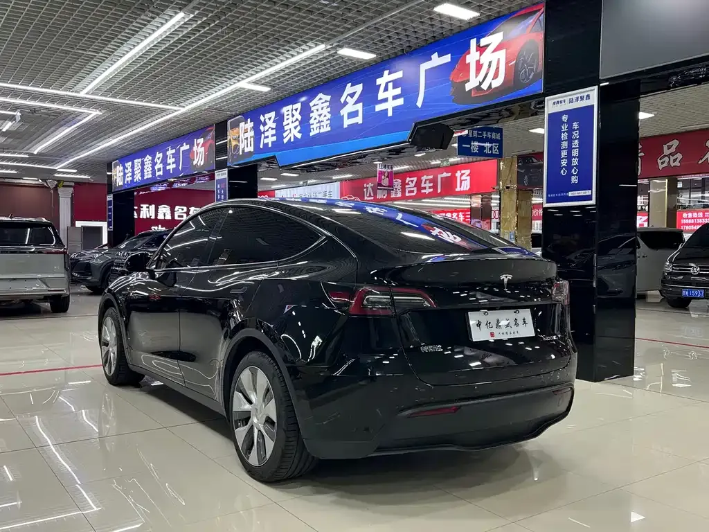 Tesla Model Y — фото 8