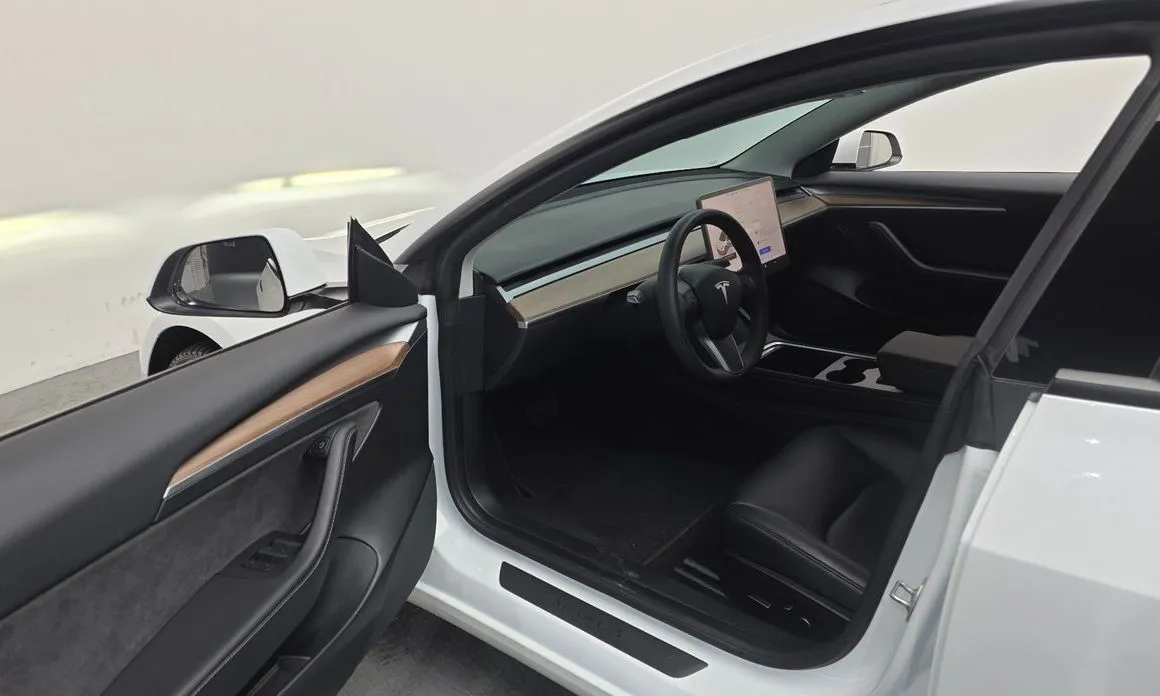 Tesla Model 3 — фото 6