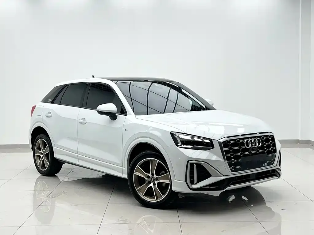 Audi Q2L — фото 6