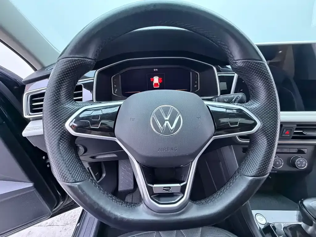 Volkswagen Tiguan L — фото 4