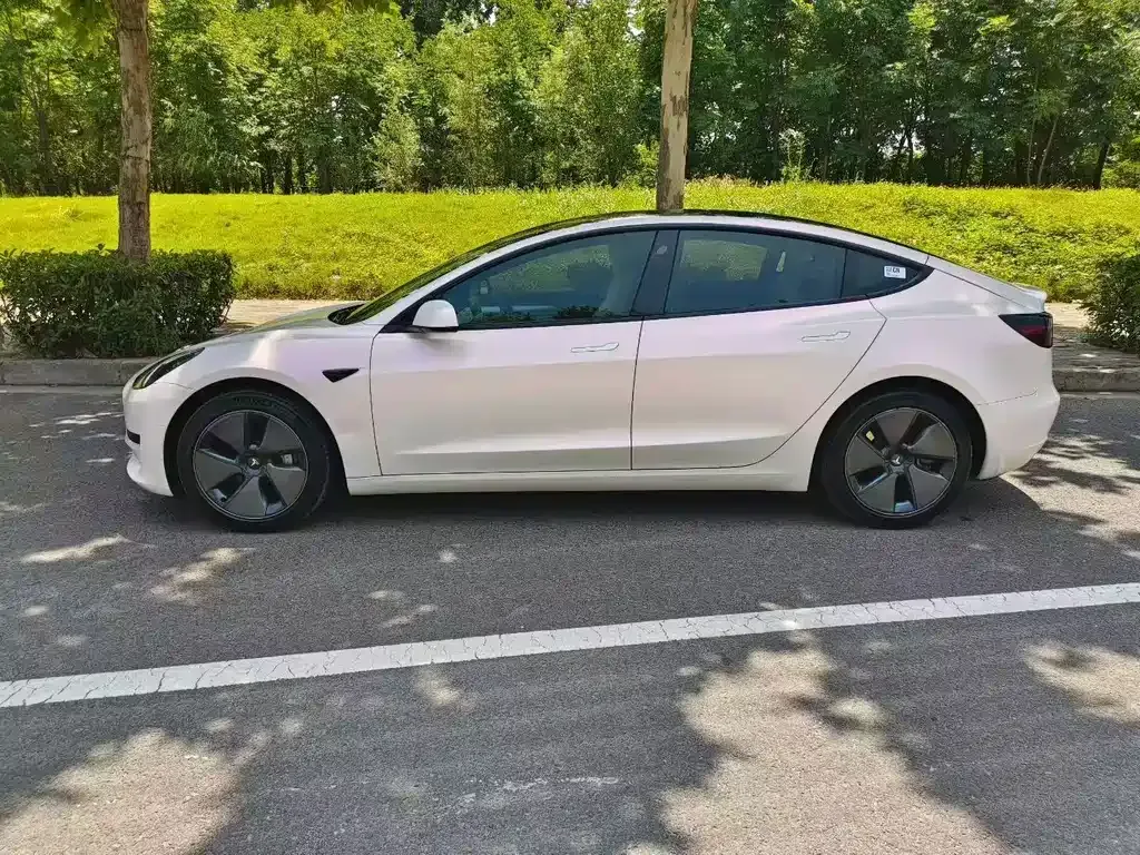 Tesla Model 3 — фото 7
