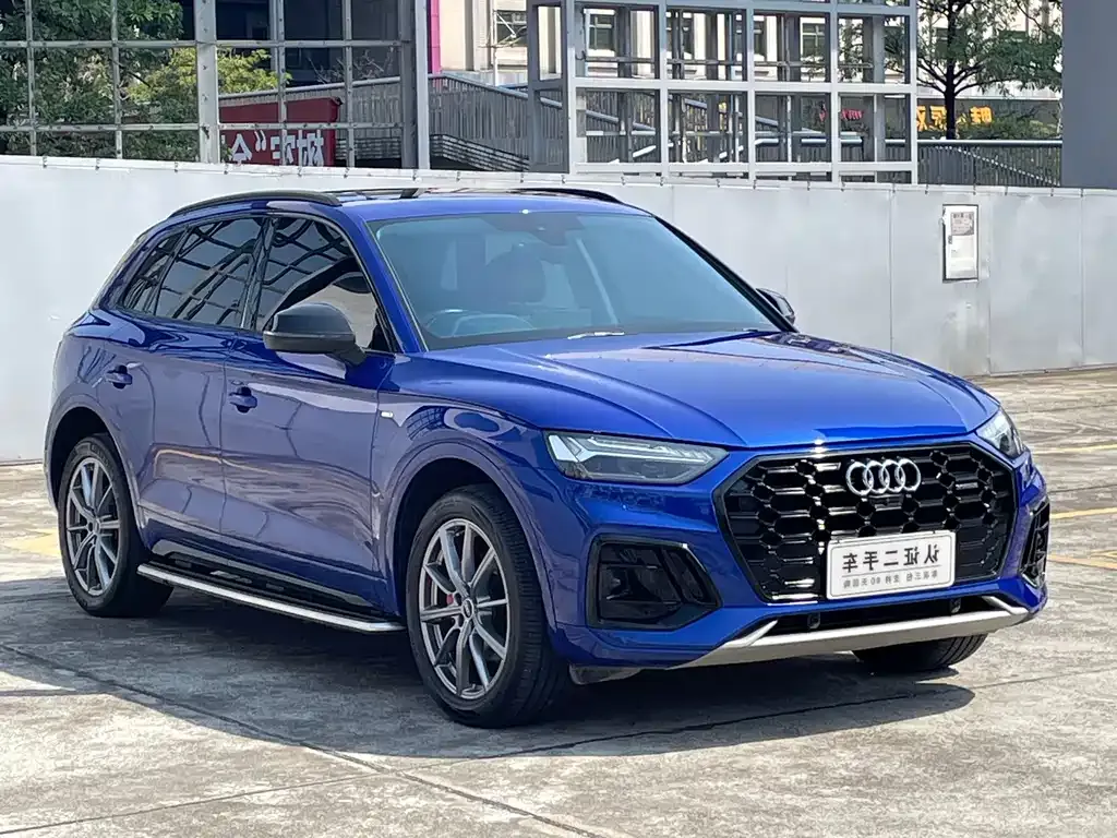 Audi Q5L — фото 6