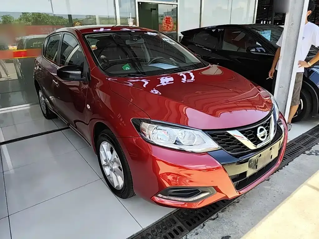 Nissan Tiida — фото 10