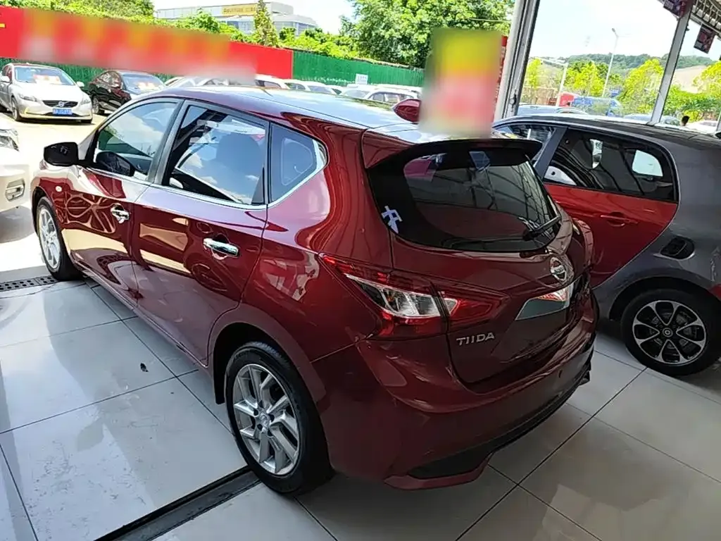 Nissan Tiida — фото 8