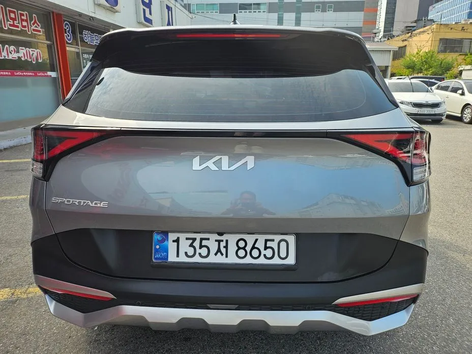 Kia Sportage — фото 10