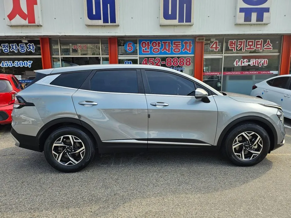 Kia Sportage — фото 8