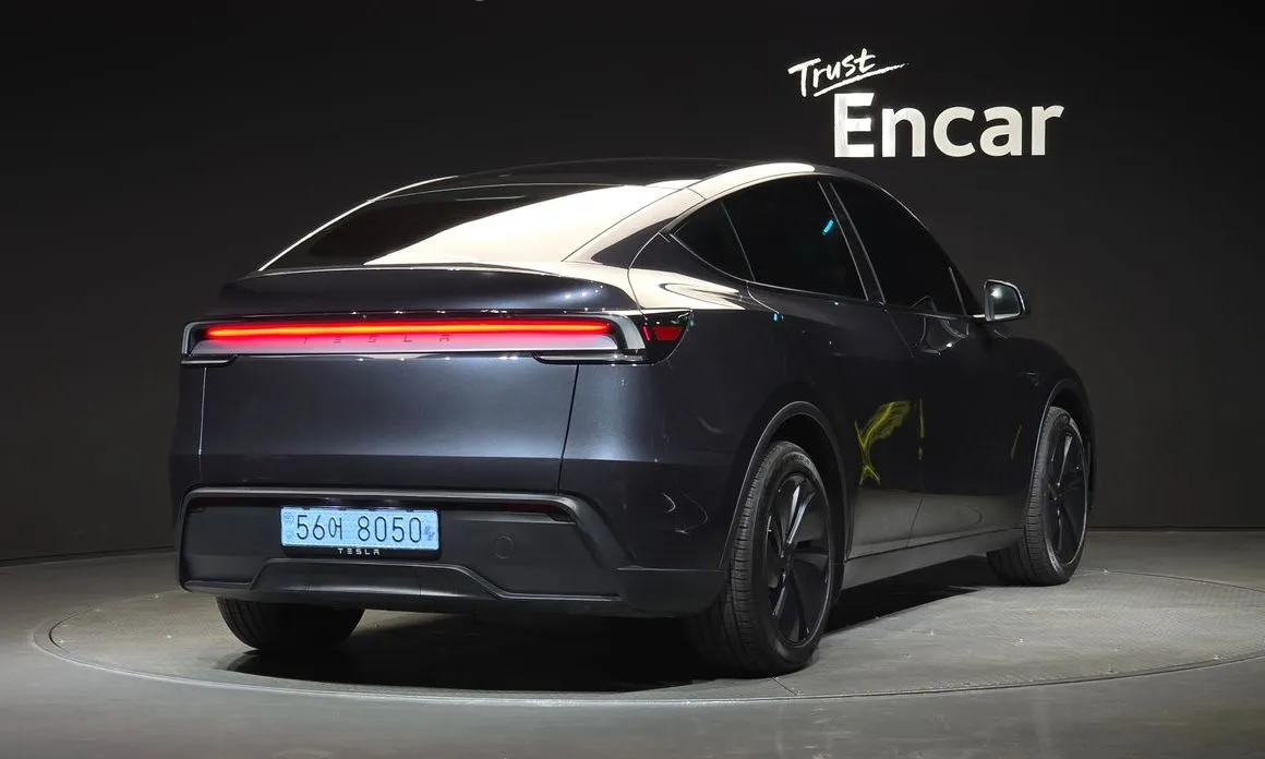 Tesla Model Y — фото 7