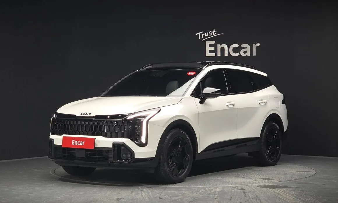 Kia Sportage — фото 1
