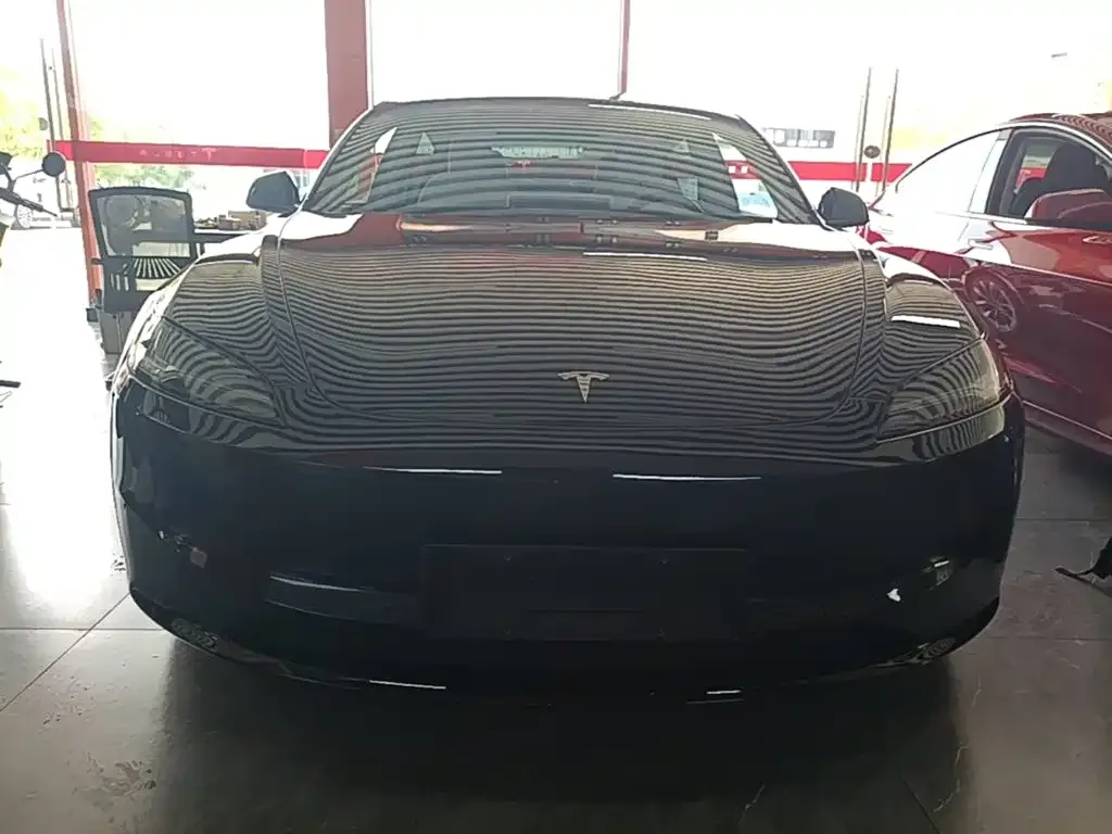 Tesla Model 3 — фото 9