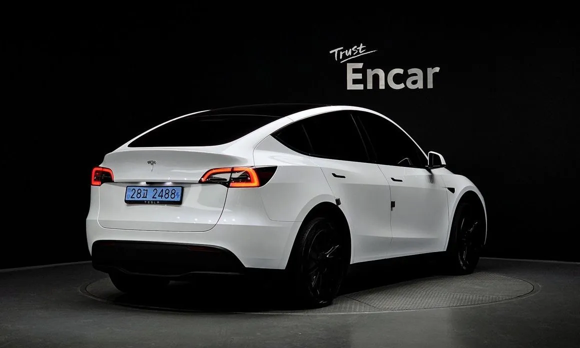 Tesla Model Y — фото 7