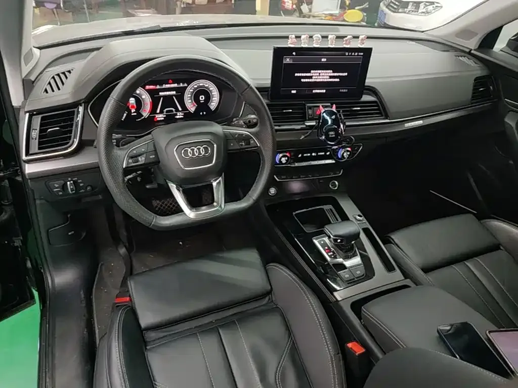 Audi Q5L — фото 9