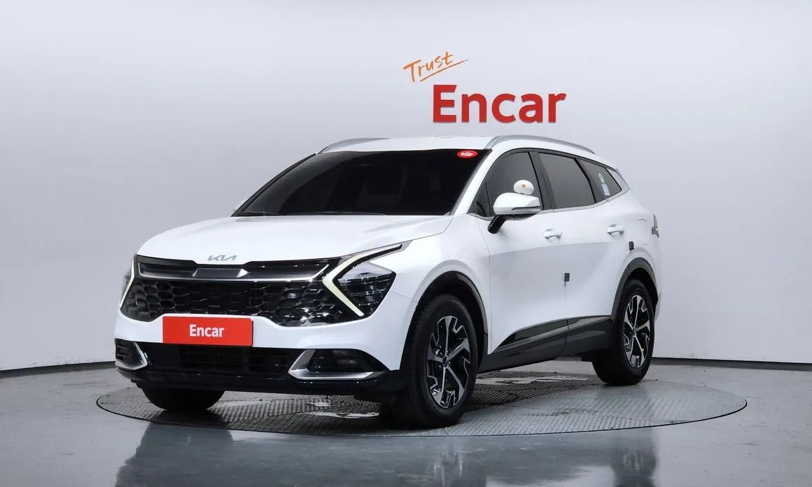 Kia Sportage — фото 1