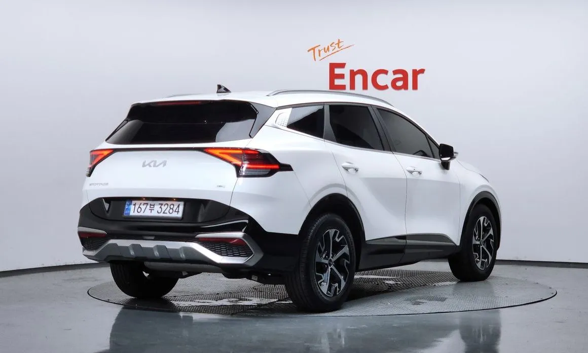 Kia Sportage — фото 9