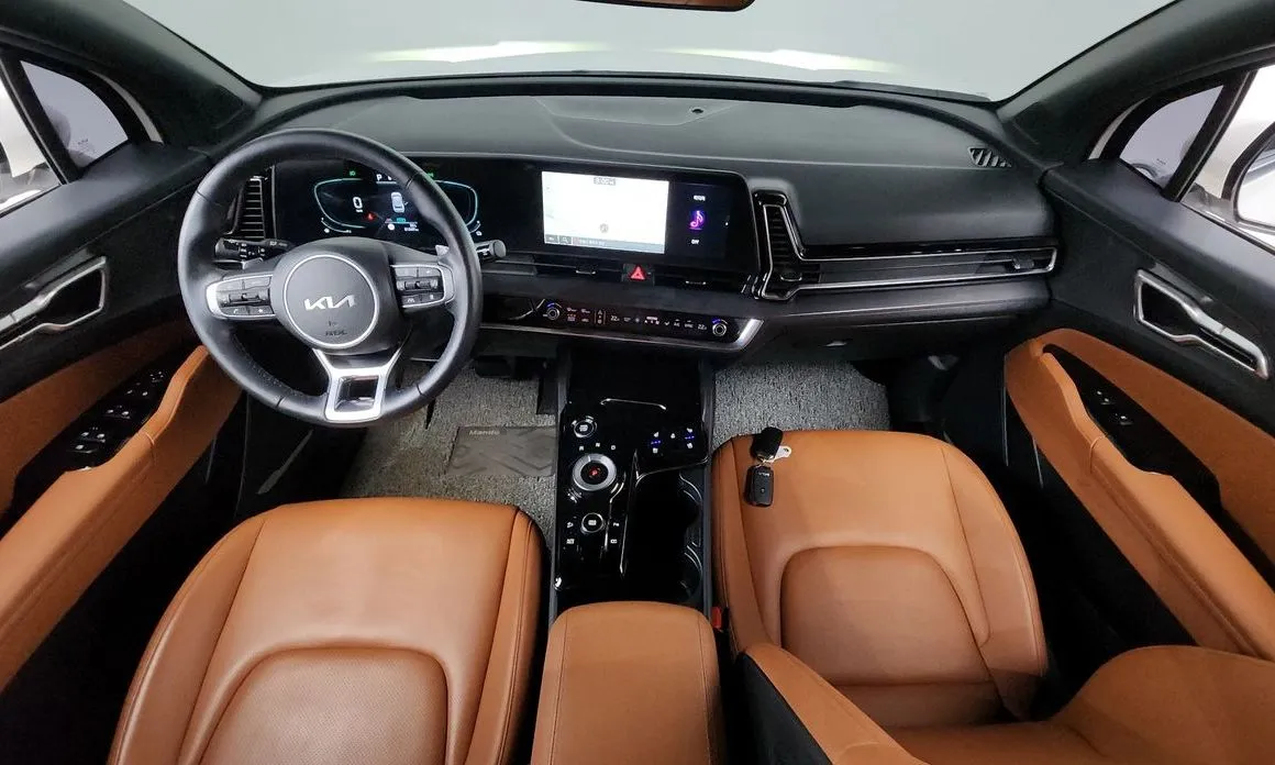 Kia Sportage — фото 10