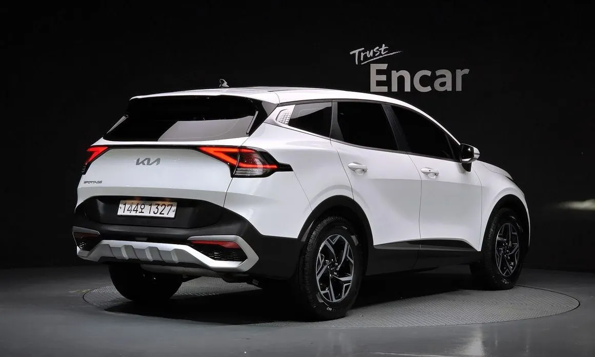 Kia Sportage — фото 8