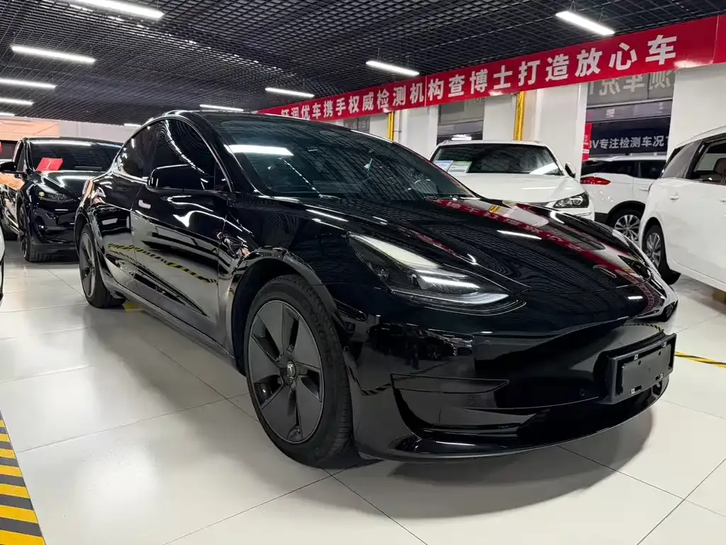 Tesla Model 3 — фото 10