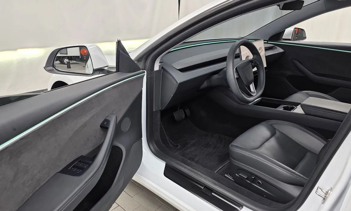 Tesla Model 3 — фото 9