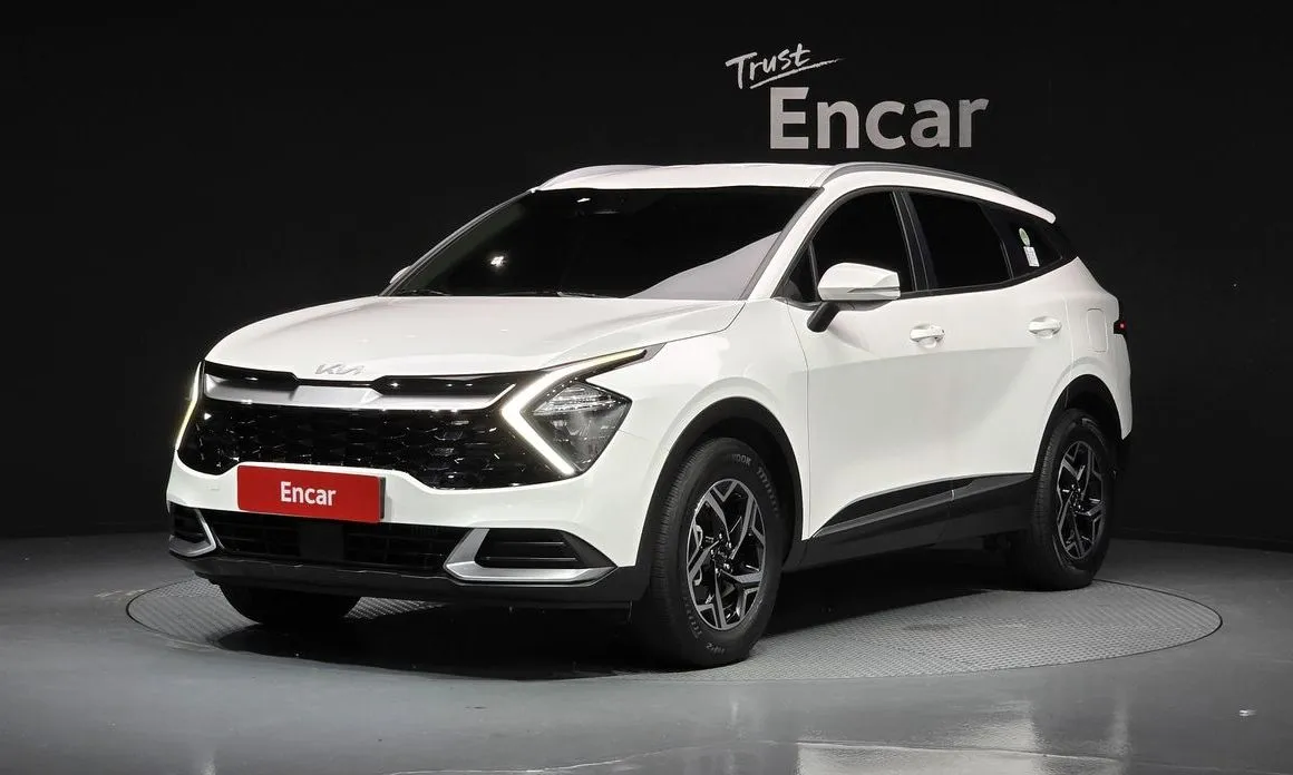 Kia Sportage — фото 1