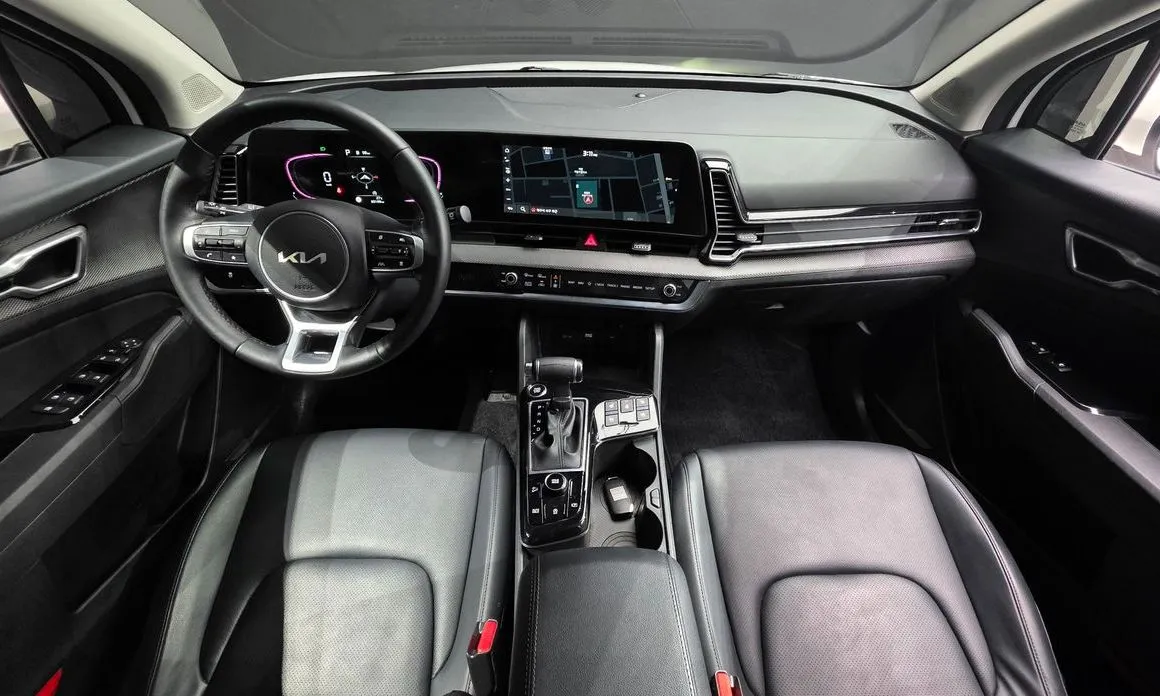Kia Sportage — фото 9