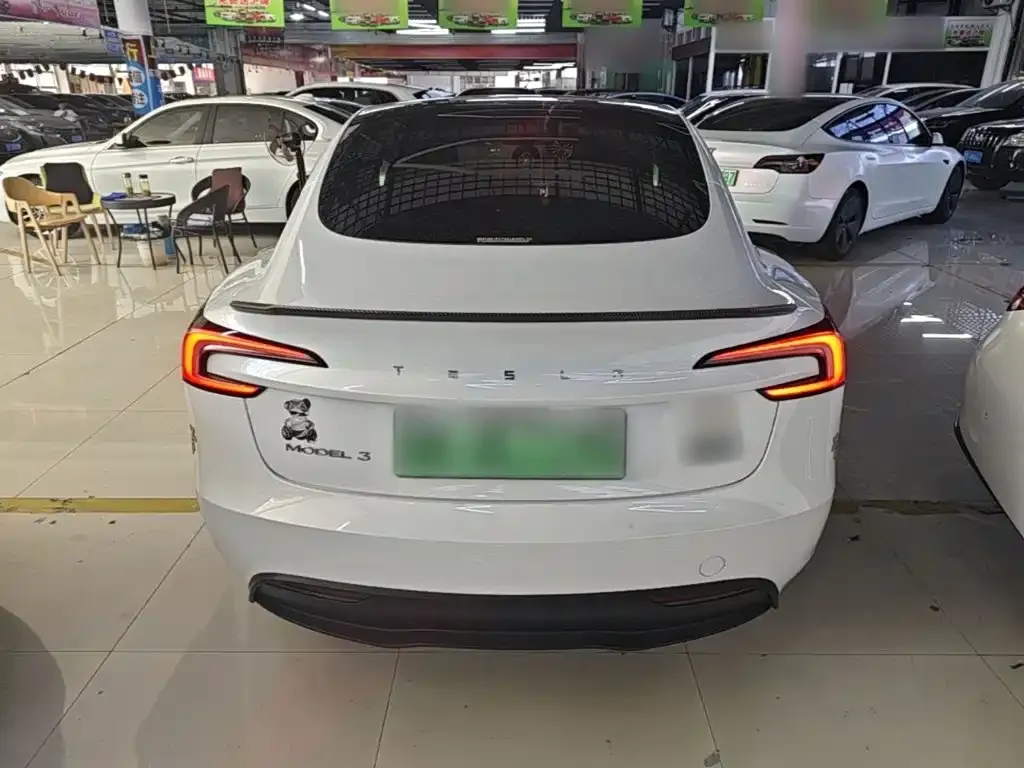 Tesla Model 3 — фото 7
