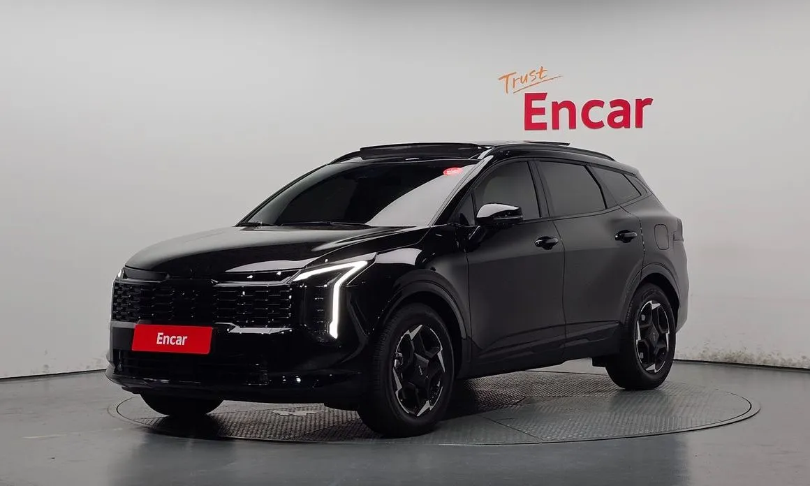 Kia Sportage — фото 1