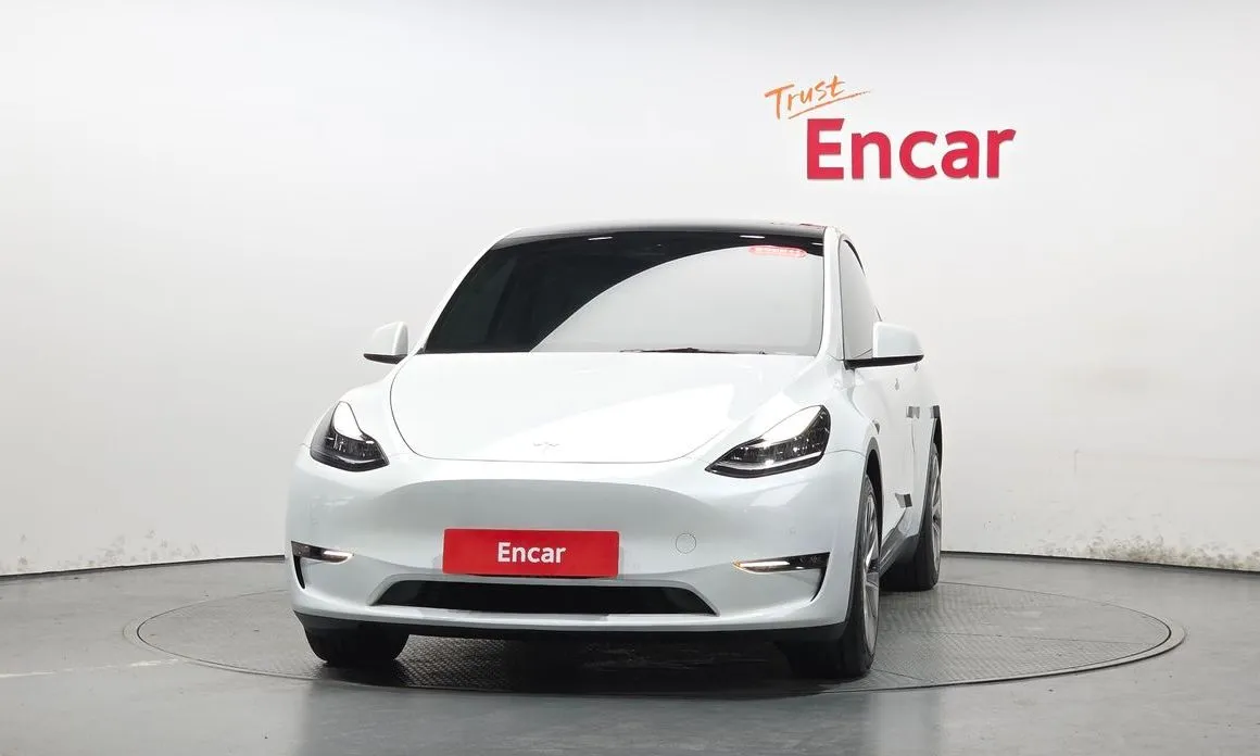 Tesla Model Y — фото 10