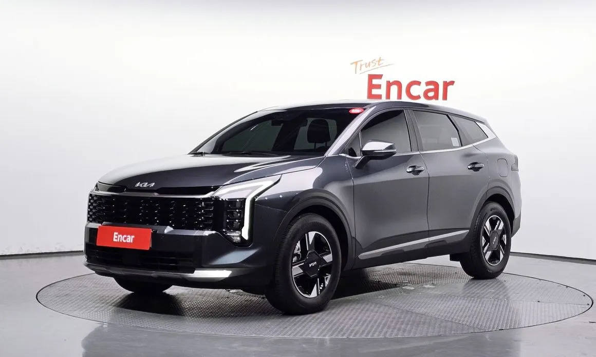 Kia Sportage — фото 1