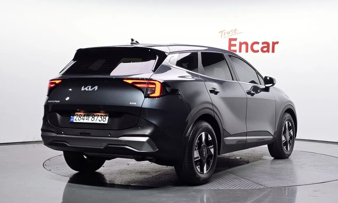 Kia Sportage — фото 7