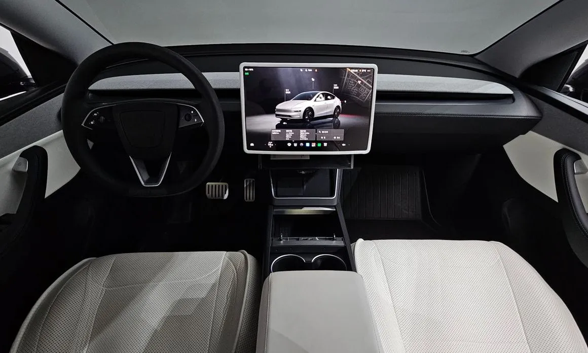 Tesla Model Y — фото 9