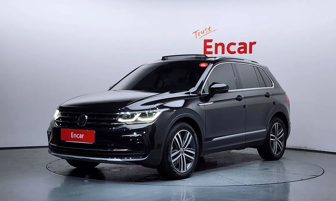 Volkswagen Tiguan — фото 1