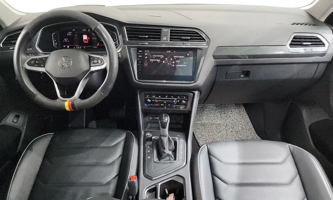 Volkswagen Tiguan — фото 8