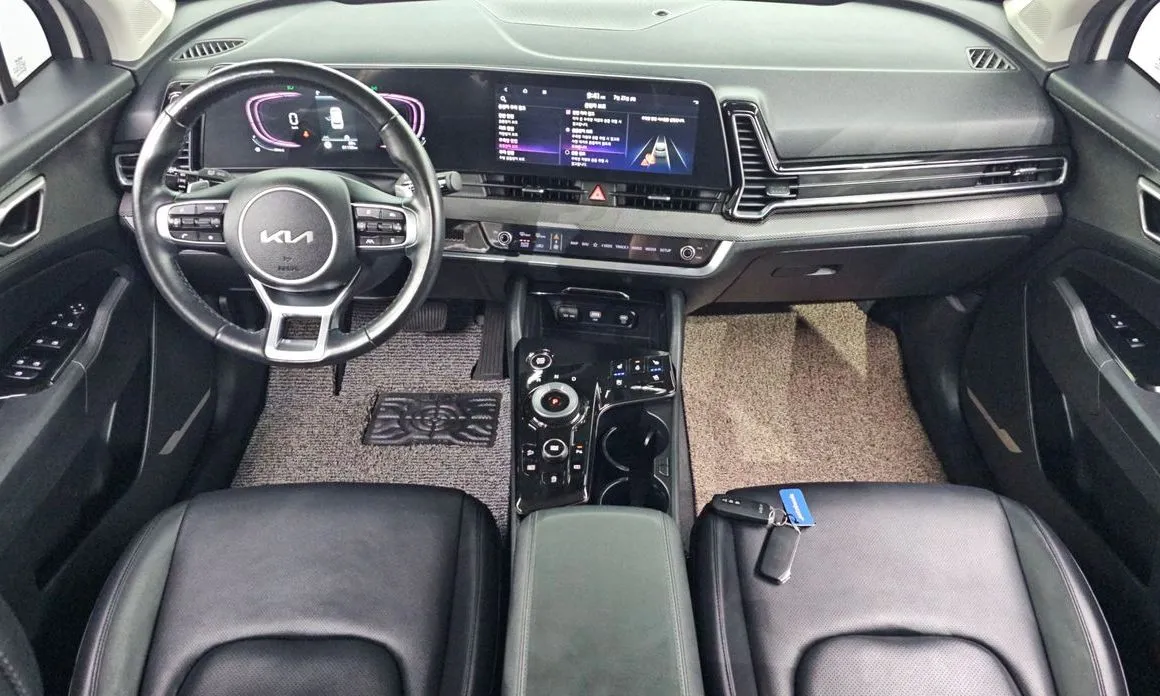 Kia Sportage — фото 9